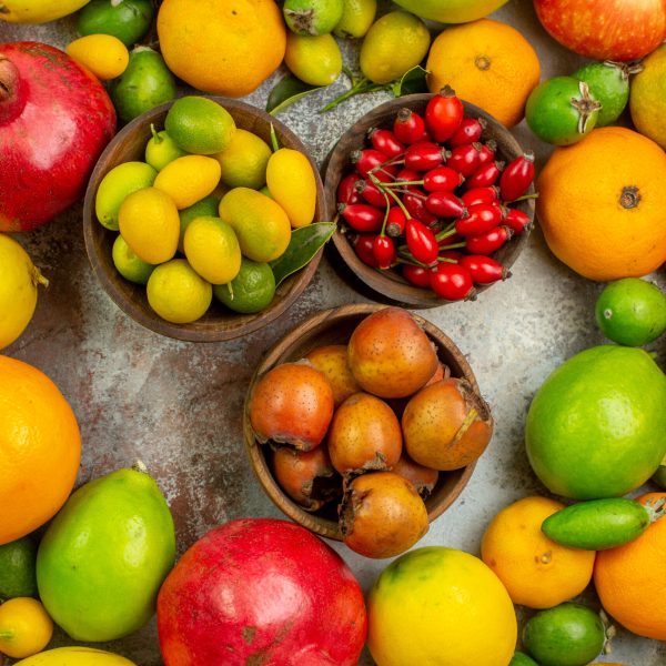 top-view-fresh-fruits-different-mellow-fruits-white-background-diet-tasty-berry-color-photo-health-ripe-tree