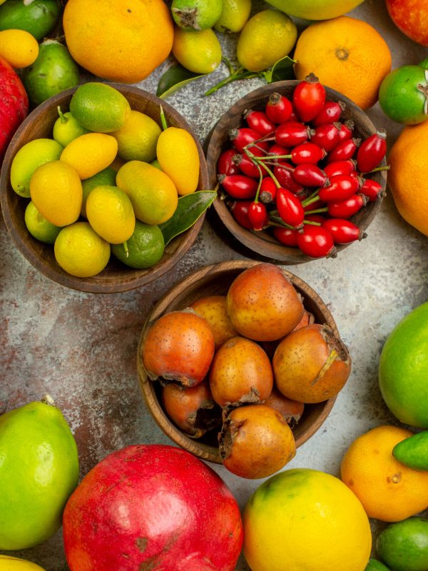 top-view-fresh-fruits-different-mellow-fruits-white-background-diet-tasty-berry-color-photo-health-ripe-tree