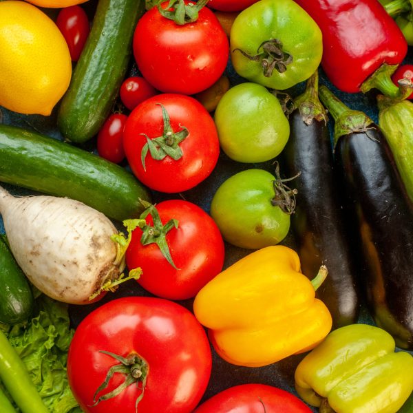 top-view-vegetable-composition-with-fresh-fruits-blue-table